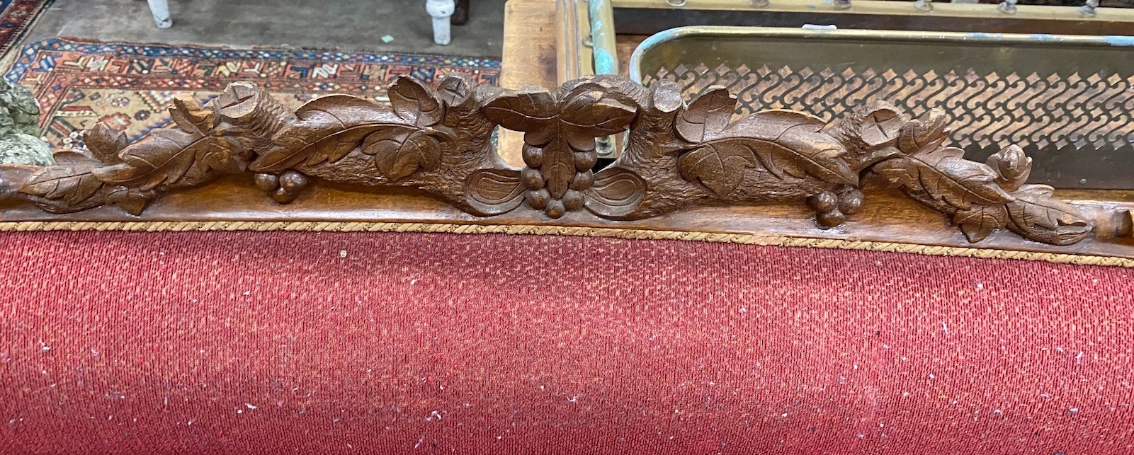 A 19th century French mahogany show-frame settee, width 183cm